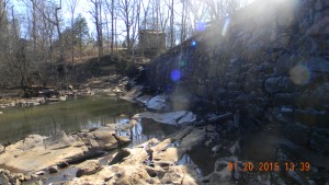 Across the  Haw river on the slopped rocks is where the photos were taken of the Altamahaw-Ossipee students dressed as native Americans to honor the former residents of bygone-years.